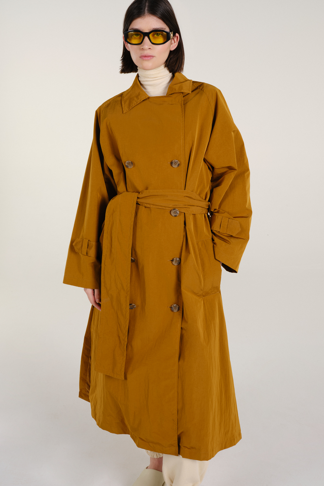 Embassy of Bricks and Logs  Trenchcoat Kalvi Goud